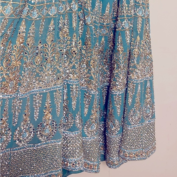 Teal Blue Heavy Lehenga, gold threading with stone and mirror accents - Picture 8 of 9